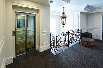 Glass panel lift door